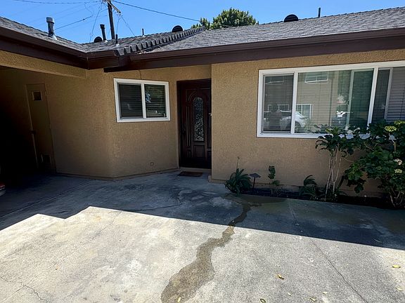 Front of the unit with convenient on-site parking, providing easy access and everyday functionality.