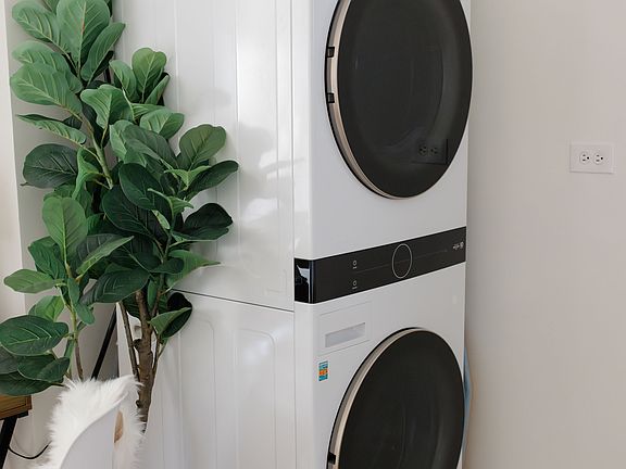 Washer-dryer in unit.
