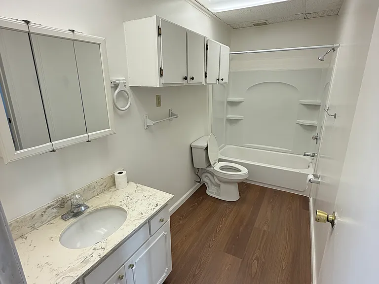 E Village Dr — Photo 5