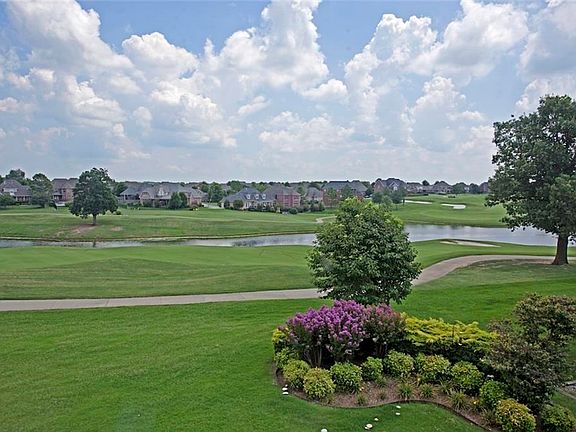 It is ALL about the VIEW!! Wow! Beautiful Colors - on property landscaping & gorgeous views of the spectacular golf course, gently rolling hills & idyllic lakes...