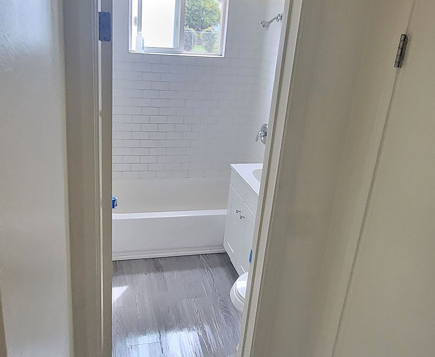 Hallway leading to bathroom