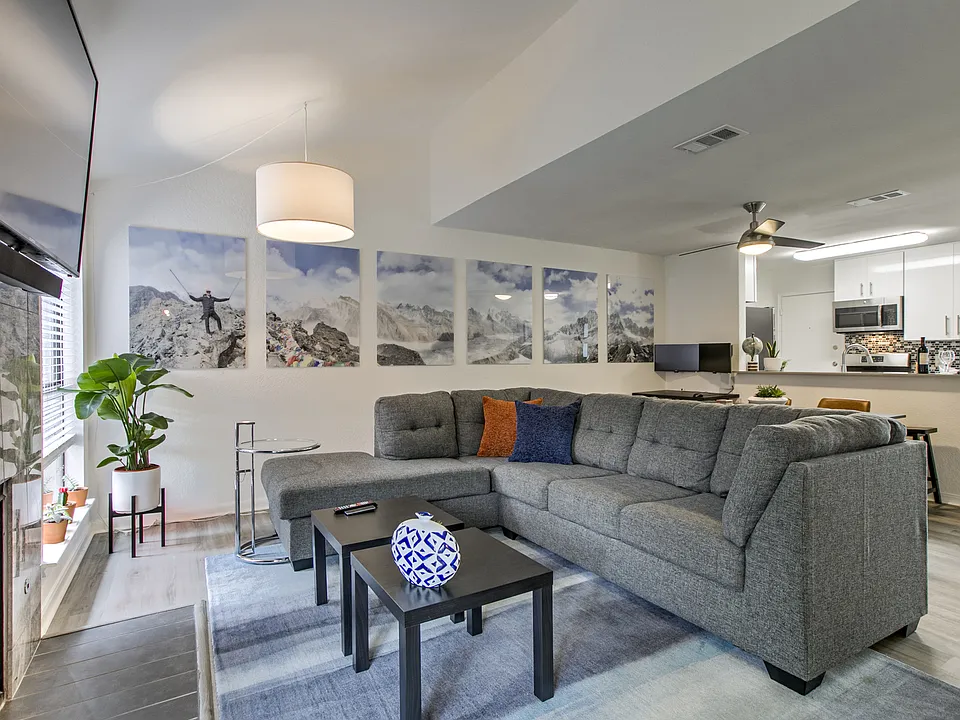 Open downstairs including living area, kitchen, and half bath