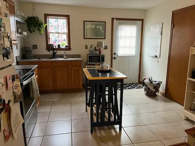 Kitchen facing the backyard and shed area