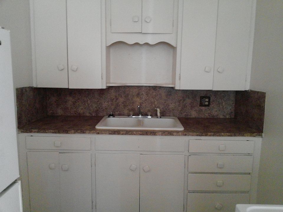 cute kitchen with plenty of storage