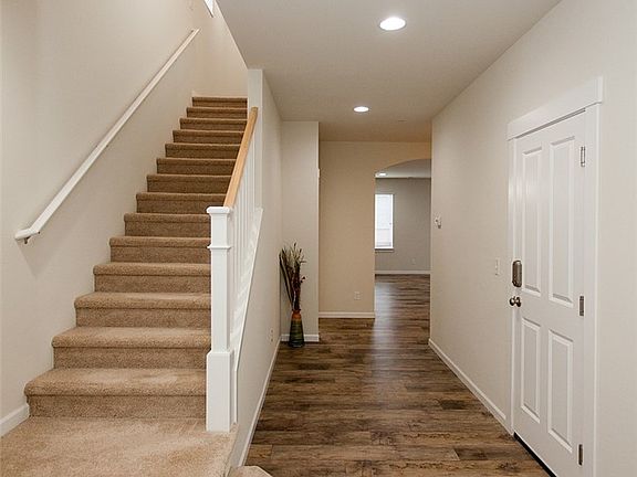 Nice wide entry way.  Wood laminate flooring throughout most of main floor.