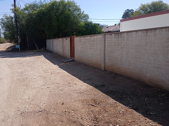 Closest parking to unit...alley is wide, 7 feet of property extend beyond the wall into alley. We often park here.