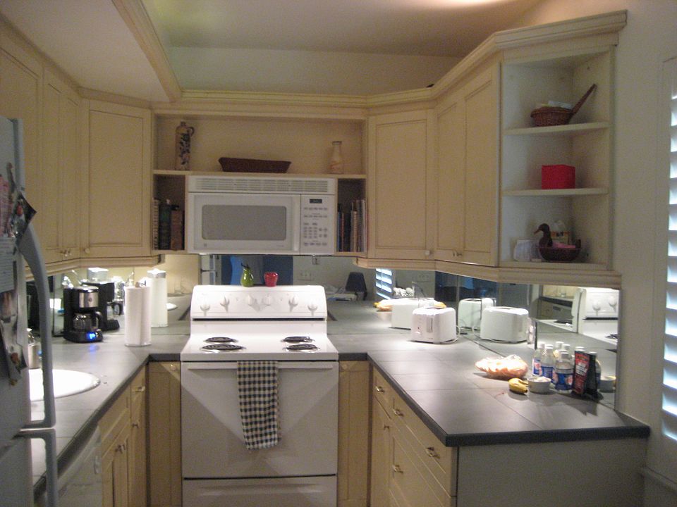 Redesigned kitchen doubles counter & cabinet space