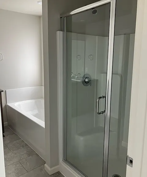 primary bathroom tub and walk in shower