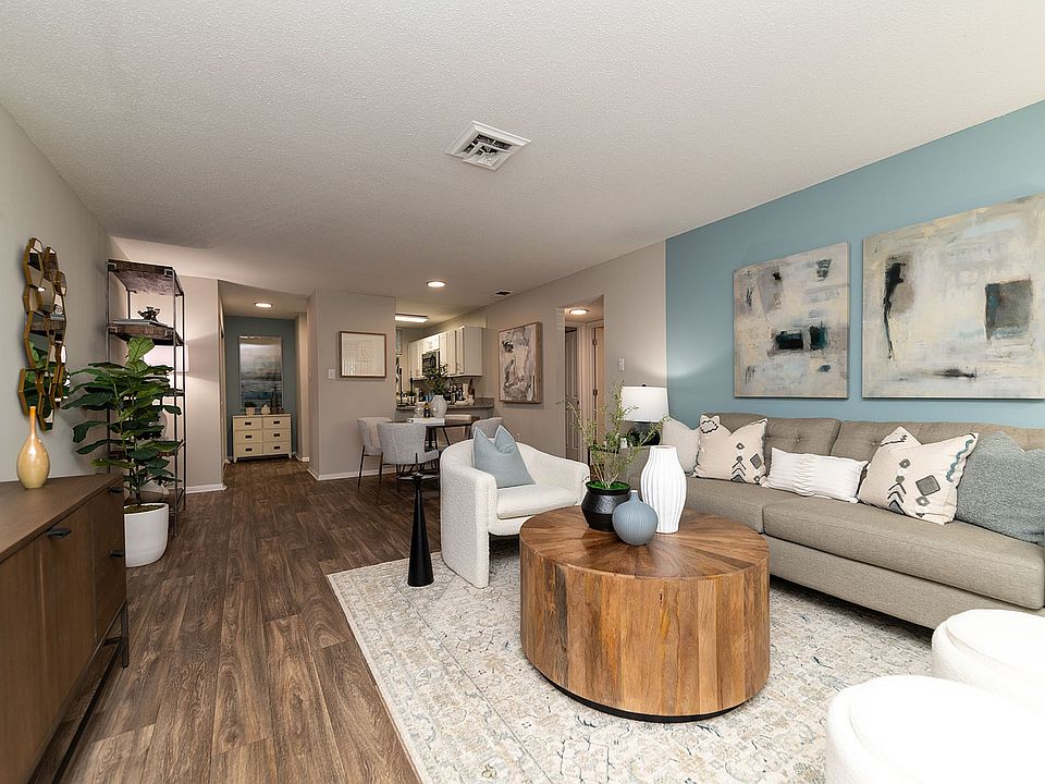 Spacious living room with hardwood-style flooring