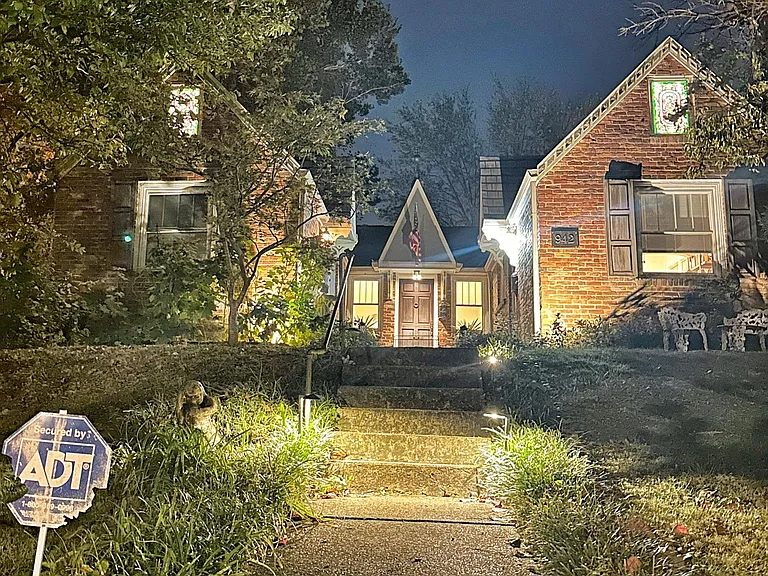 The Valentino at night is majestic with lit stain glass windows welcoming you home.