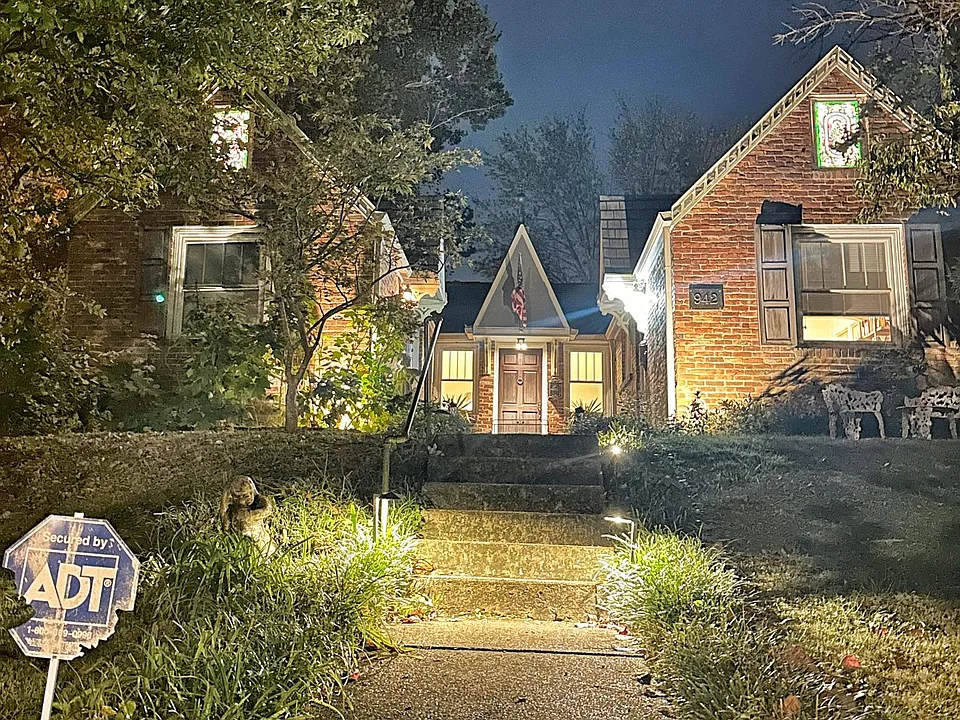 The Valentino at night is majestic with lit stain glass windows welcoming you home.