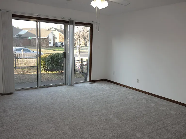 1st bedroom, street facing with sliding glass door! *This sliding door will be converted into a window*