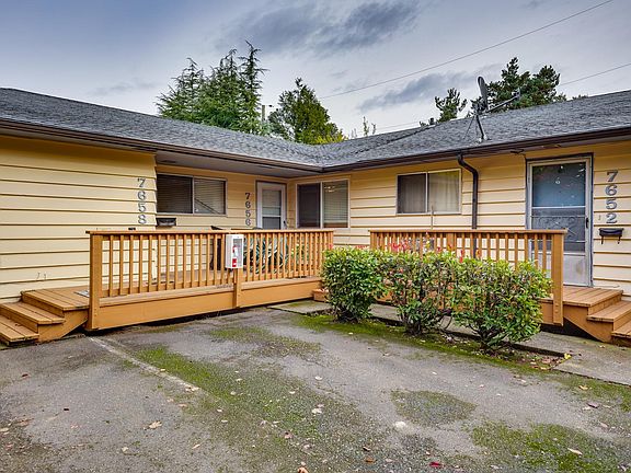 Front of unit and parking lot