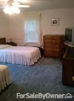 Bedroom
						:
						Large bedroom w/closet. Pictured with 2 twin beds. Hardwood floors in bedrooms!