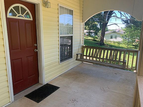 Covered porch with swing!