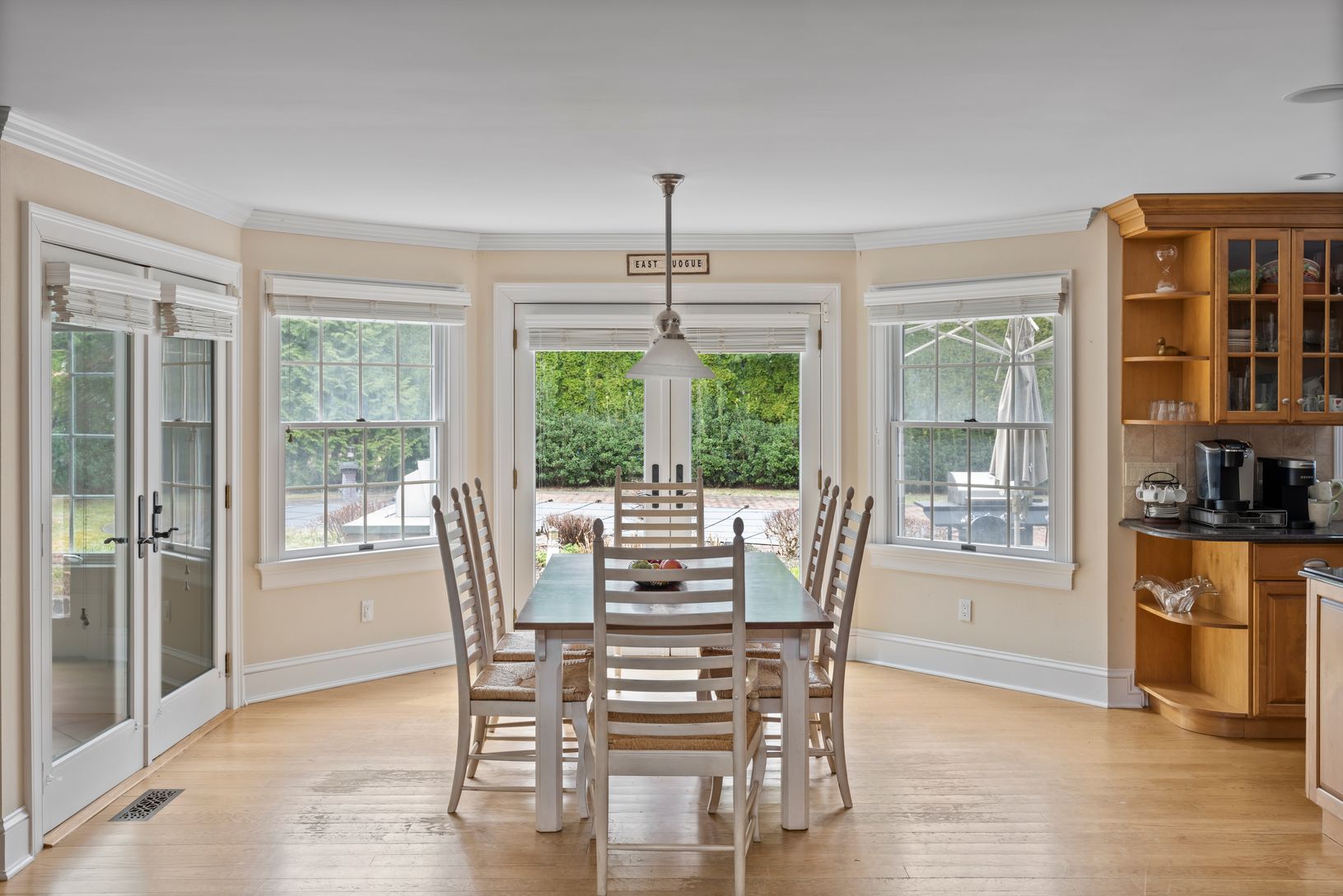  Breakfast Nook overlooking backyard oasis and opened to Sunroom