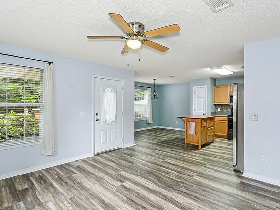 Open concept to Living Room, Kitchen and Dining.