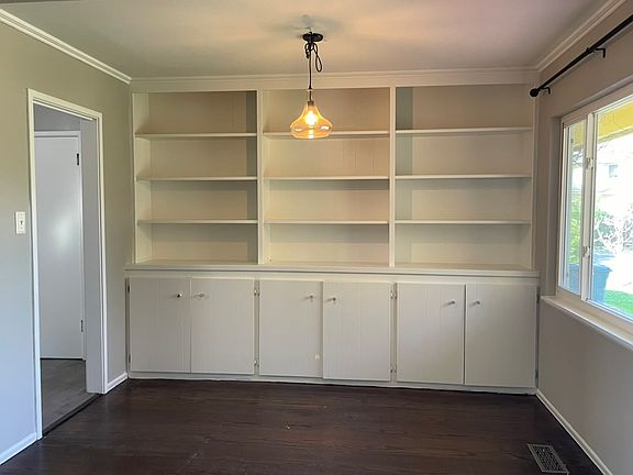Dining area with built-in shelving