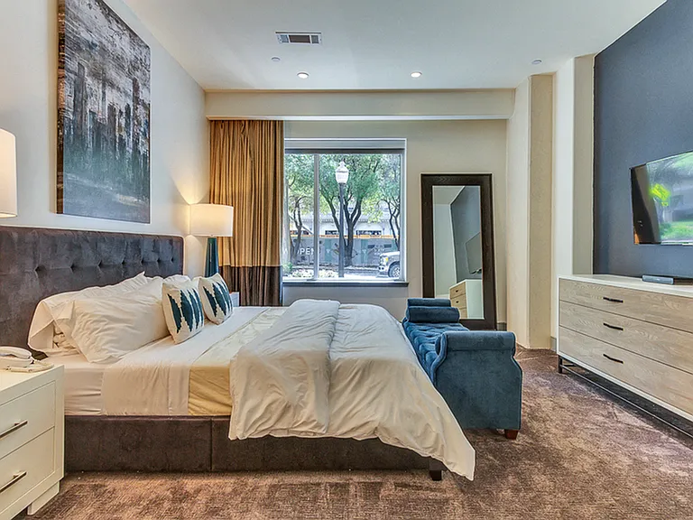 Spacious bedroom with luxury finishes