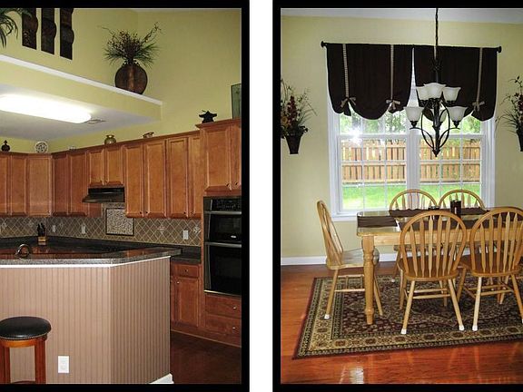 exquisite, upgraded kitchen opens to breakfast nook with vaulted ceiling
