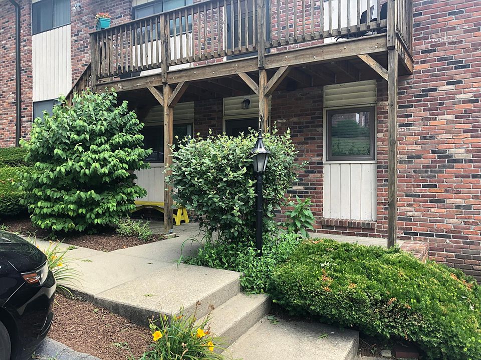 Front of the unit with parking directly outside