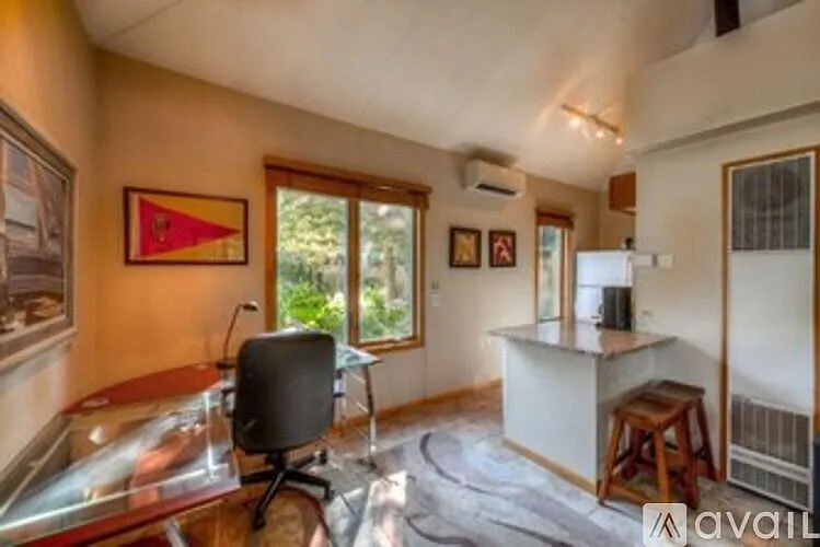 Guest House office, Full Kitchen and 15' Ceilings. New central air conditioning and gas heat furnace. Kitchen includes microwave, gas stove/oven, refrigerator and washer/dryer plus all cooking tools