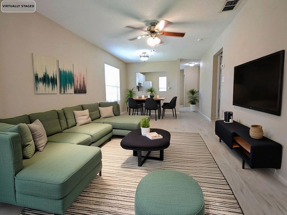 COMPUTER GENERATED. 

Virtually staged family room.