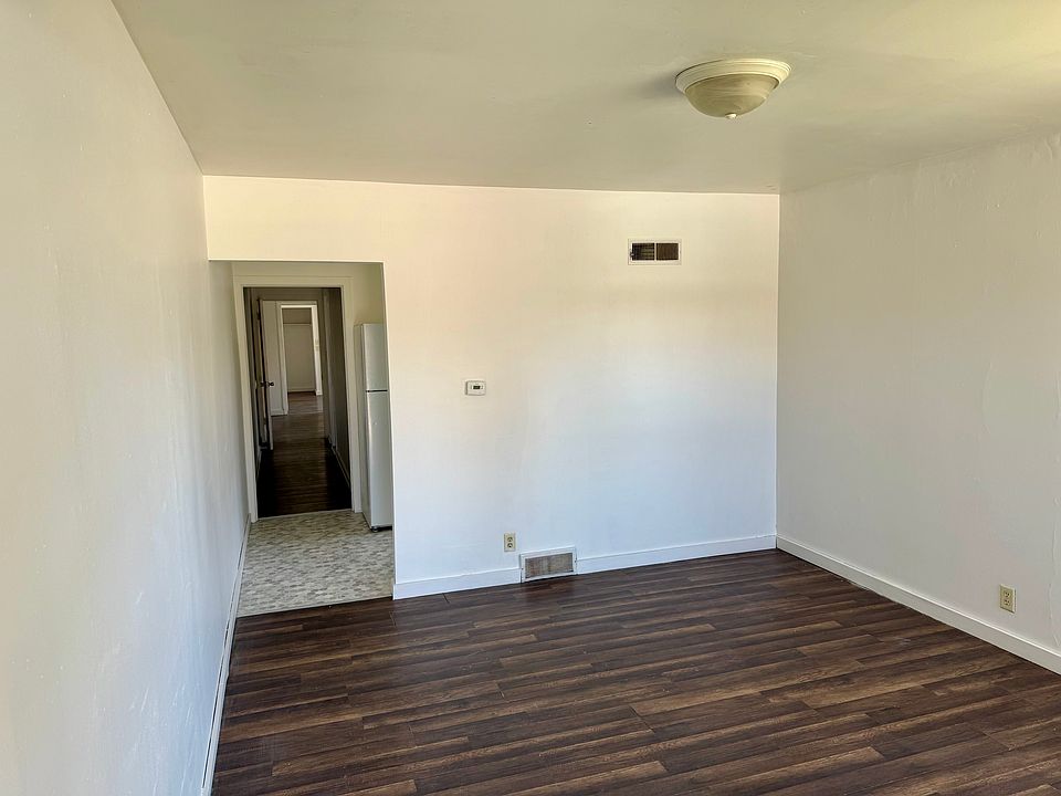 living room going into kitchen then hallway