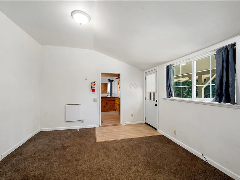 office with access to exterior to backyard