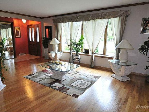 Living Room, featuring Oak Floors, Natural Light