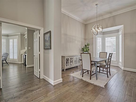 The home has been extensively remodeled and upgraded throughout! The hardwood floors continue throughout all the main living areas, dining room, kitchen and master bedroom! The Large formal dining room is located to the right as you enter and very ea