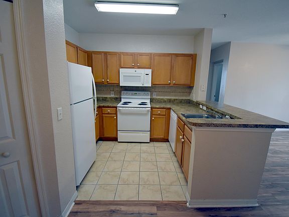 Kitchen - All appliances: fridge, oven, microwave and dish washer. Cabinets and nice counter.