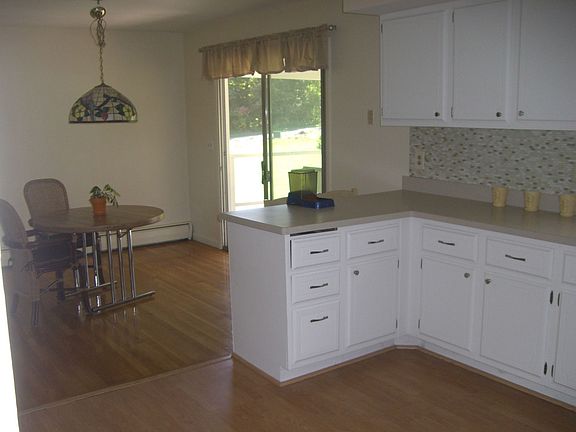 Partial kitchen & dining room