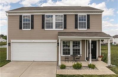 Beautiful stainless steel appliances in this efficient kitchen with pantry