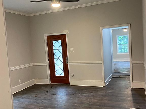 View from hallway to front door and front bedroom