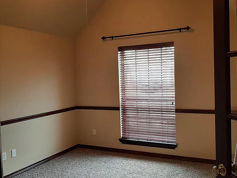 Office with french doors. Could be used as a bedroom. Has closet.