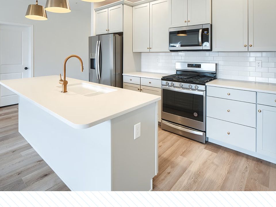 Spacious Kitchen with Upgraded Counter Tops, Refrigerator, Stove, Microwave and Cabinets