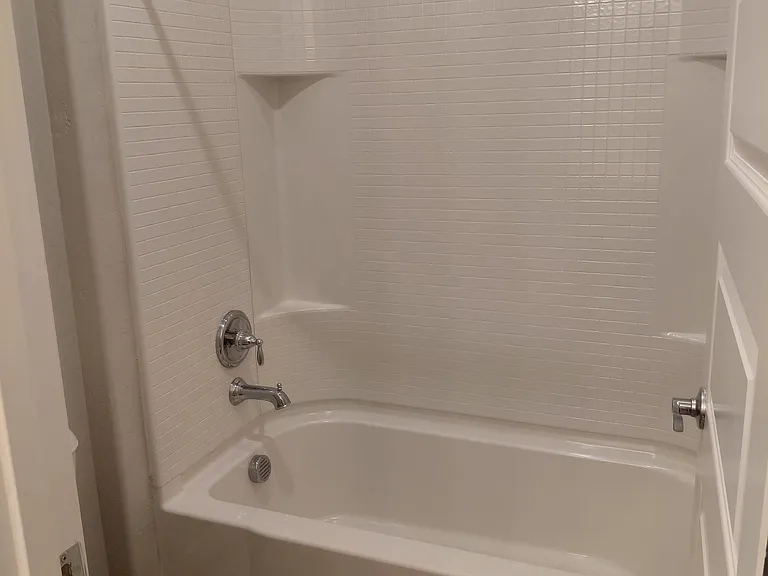 Upstairs Bathroom bathtub and toilet