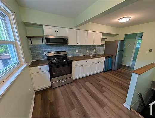 3 bed, 1084 sqft, $1,250 — Photo 3