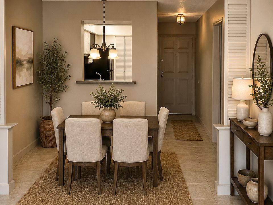 Dedicated dining area adjacent to the kitchen, offering a comfortable space for everyday meals, entertaining, or working from home. (Virtually staged.)