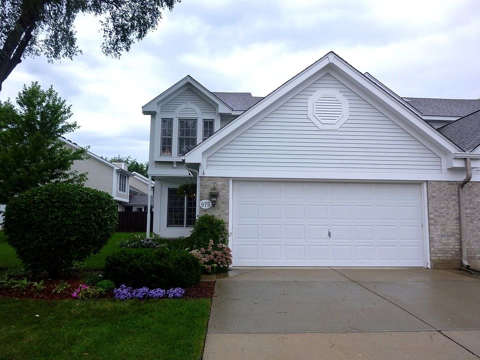 Great curb appeal, mature landscaping, private entrance