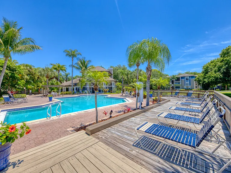 Two swimming pools with plenty of seating options