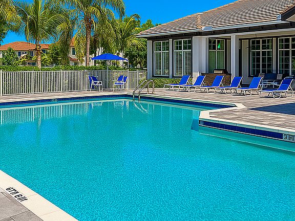 Outdoor pool area with sundeck