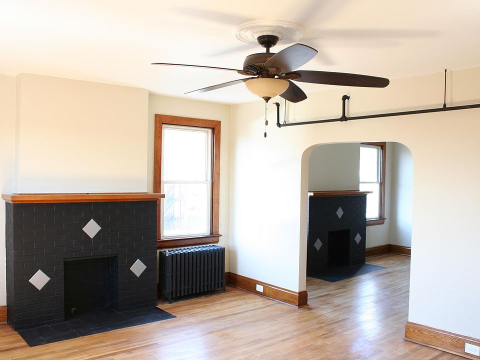 Decorative fireplaces in living and dining room
