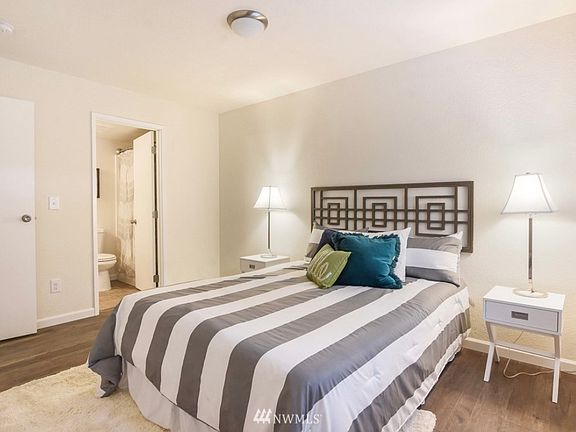 Primary Bedroom; Staged to showcase multiple furniture arrangements and flexible use of space.
