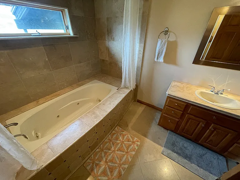 Bathroom 1 with jacuzzi tub and rain shower