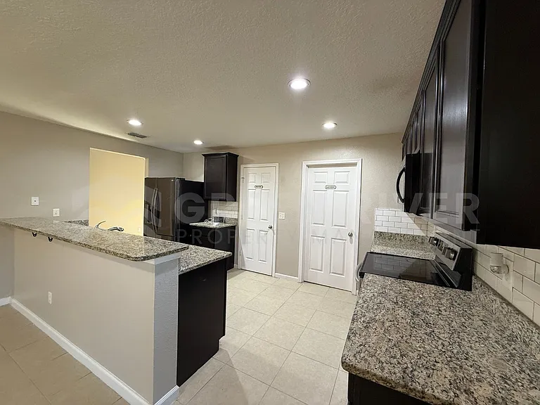 8704 Lake George Cir W — Photo 8