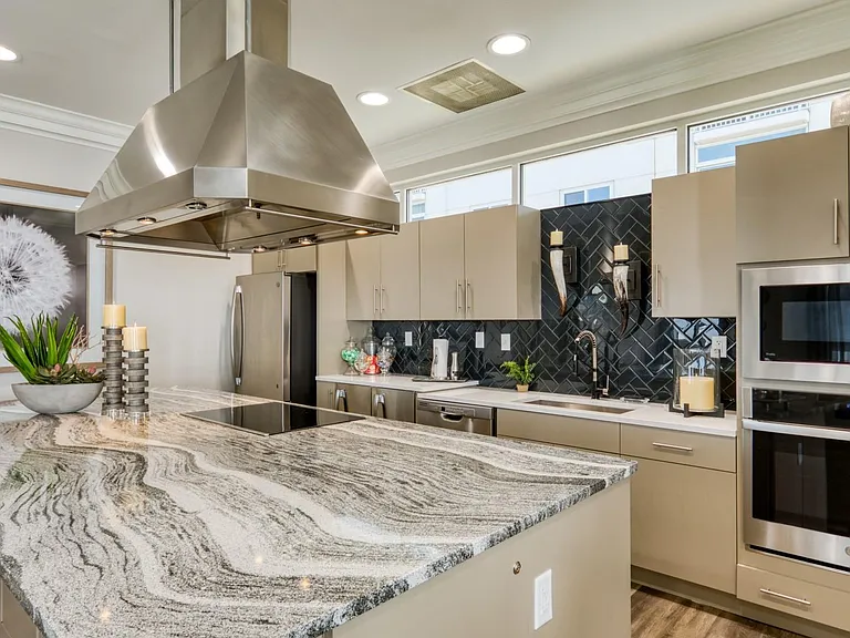 Clubroom with a full kitchen and commercial hood