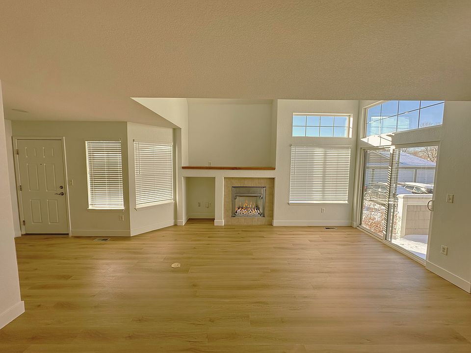 Dinning / Living Room - New LVP, Paint, Blinds, and a tuned up Gas Fireplace