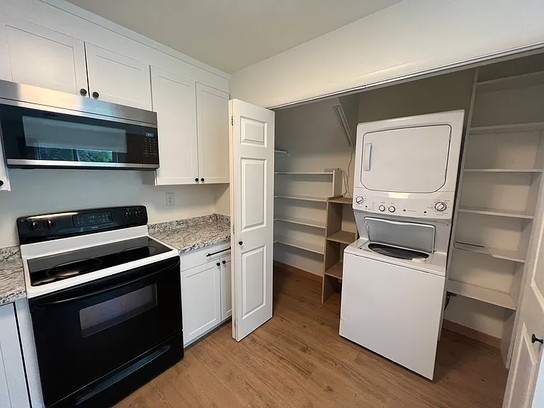 Laundry and pantry located in the kitchen